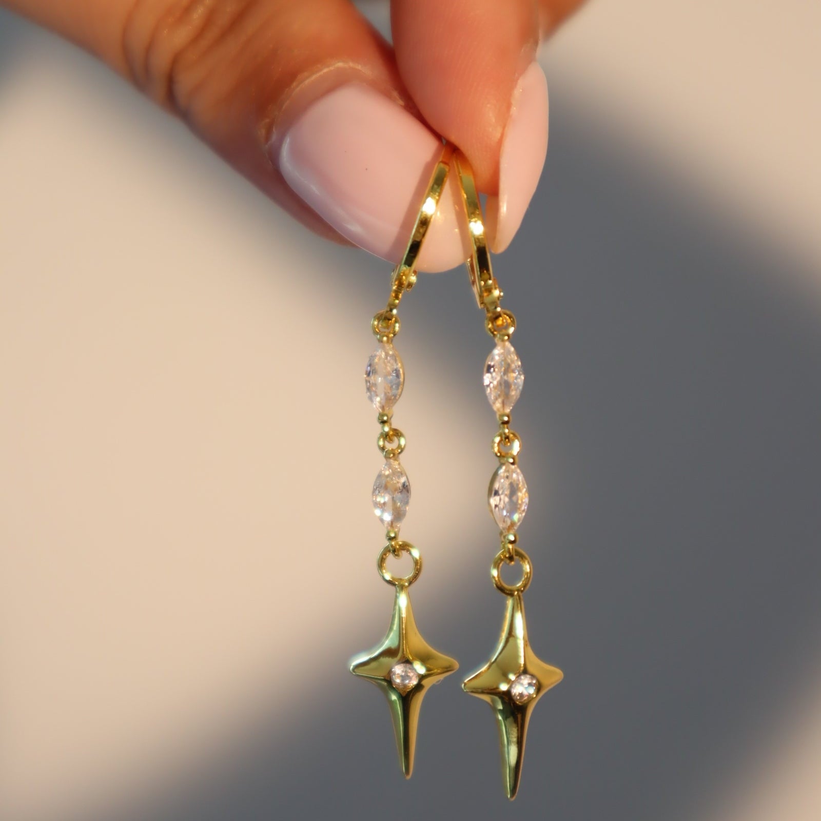 Dangly 18K Gold Star Plated Earrings