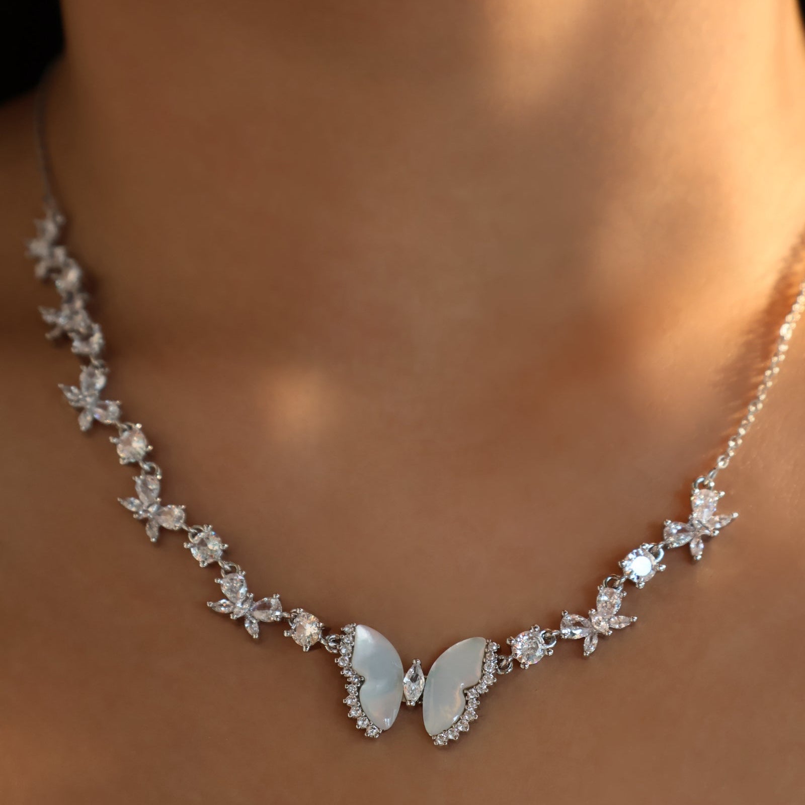 Elara Butterfly Diamanté Necklace (gold & silver)